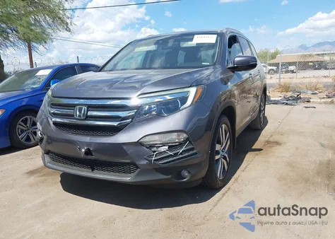 2018 Honda Pilot Touring from USA, damaged, VIN 5FNYF5H99JB021983